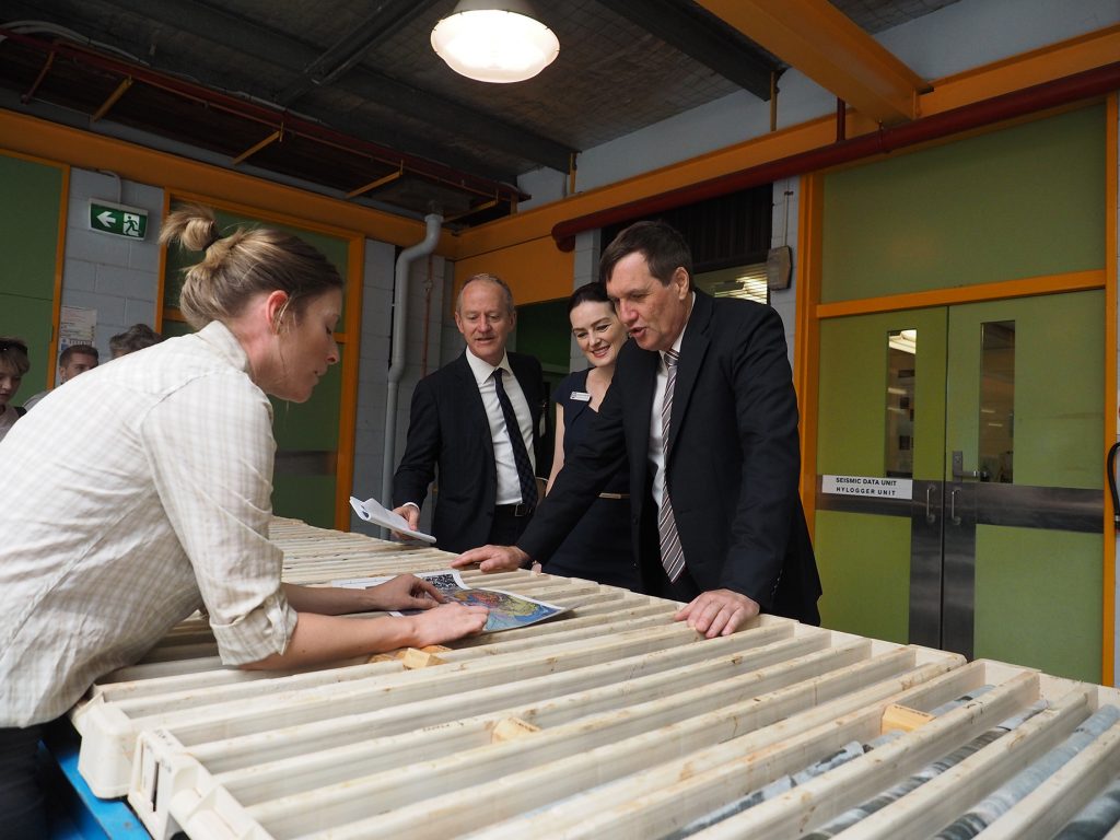 From left, Geoscientist Sarah Sargent discusses drill core samples with Chief Government Geologist Tony Knight, Member for Nudgee Leanne Linard and Minister Anthony Lynham.